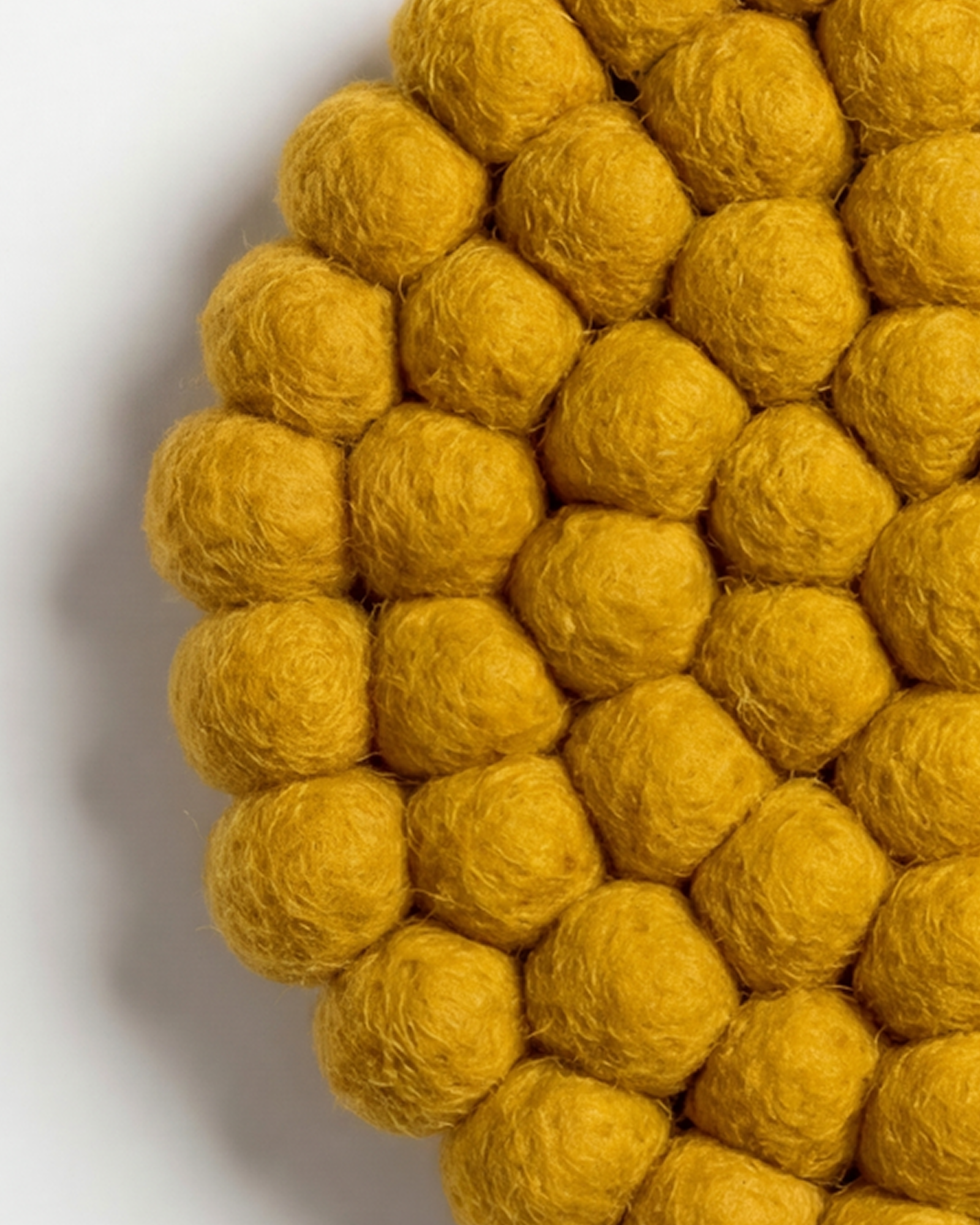 Aveva Mustard Wool Round Trivet